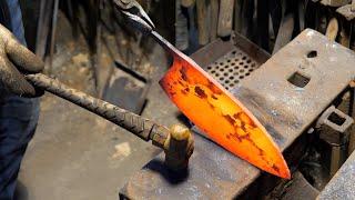 process of making a fish knife. 106 Year Old Korean Smithy.