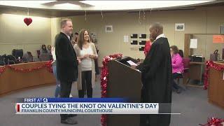 Dozens of couples celebrate Valentine's Day with courthouse weddings