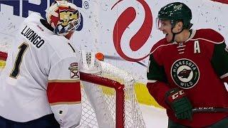 Luongo goes all-in and must recover to make save on Parise