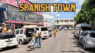 Driving through the town of Spanish Town | 876 By Birth