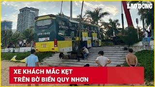 Xe khách mắc kẹt trên bờ biển Quy Nhơn | Báo Lao Động