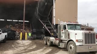 AWESOME 100 Yard Demolition Dump Truck dumping at Transfer station  from Demo job