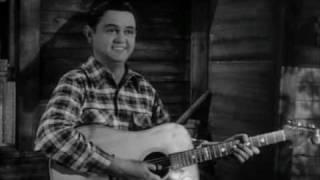 Merle Travis performs Nine Pound Hammer and Mus'rat.