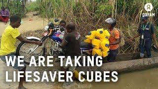 Cyclone Idai - delivering aid by motorbike and canoe | Oxfam GB