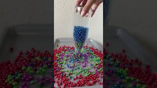Pouring and reverse #satisfying #stonebeads #pearlaccessories #beads #pearlbeads #oddlysatisfying