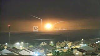 Flares and projectiles light up night sky over Gaza Strip
