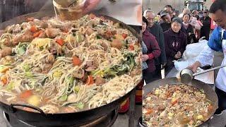 A Chinese man serves free dinner to the elderly in rural areas