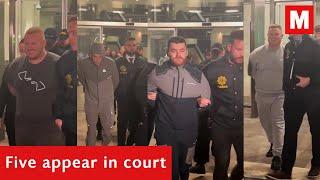 Five appear in court accused of waterboarding and branding man, threatening rape