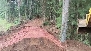 Excavator in the trench.. making a dam...