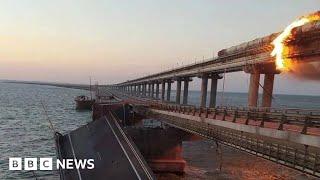 Crimea bridge partly reopens after huge explosion, Russia says - BBC News