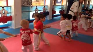 Tug-of-war at taekwondo lesson