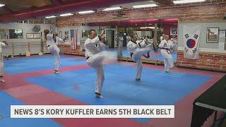 Kicking things up a notch: Kory Kuffler earns 5th degree black belt