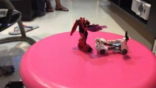 The Transformers fight (Stinger vs. Wheeljack and Bumblbee  Transforming)