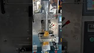A famous scene of a  chips packaging machine,Imagine what else can it wrap? #machine #package