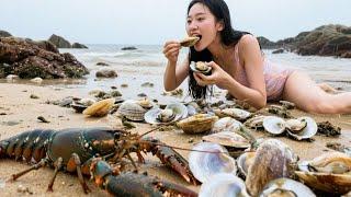 After The Heavy Rain, The Beach Was Full Of Clams. Xiao Zhang Ate Them And Almost Broke His Teeth.