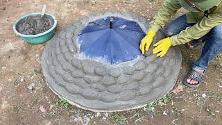 Unique creation from cement and umbrella - Beautiful duck-shaped fountain design in the garden