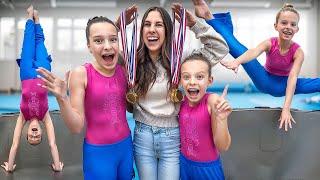 OUR FIRST GYMNASTICS MEET!  WINNING Acro, Flips, Bar