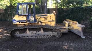 Komatsu D58P dozer grading.