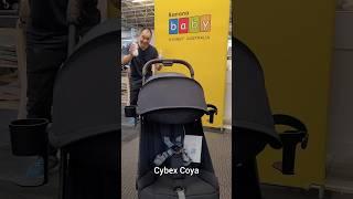 Cybex has 2 cup holders. I'll buy the one that can fit my bottles.