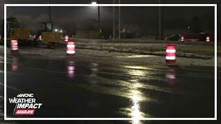 NCDOT crews work to clear snow, ice from roads after winter storm