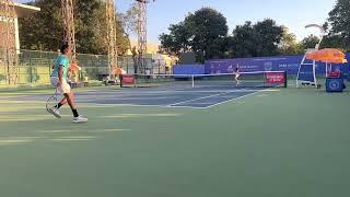 Mukund Sasikumar hitting with ATP #60 Benjamin Bonzi