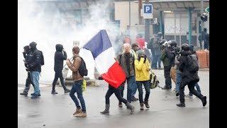 Paris police fire tear gas on 'yellow vest' protests anniversary