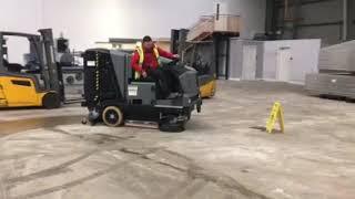 The B300 RI Combination Ride-On Sweeper and Scrubber Dryer in action.