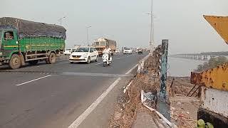 Fast moving vehicles at  Vashi creek bridge, Vashi, Navi Mumbai, Maharashtra, India