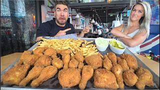 UNIMPRESSED LADY SAYS I'LL FAIL THIS 24 PIECE FRIED CHICKEN CHALLENGE | Joel Hansen