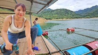 The girl makes a fish cage frame that floats on the water.