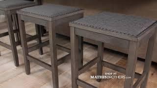 Ashley Caitbrook Counter Height Dining Table and Bar Stools