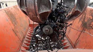 You will be amazed how easily this crusher can destroy large cars for the recycling process.