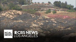 Hawarden Fire victims survey their burned homes and start to rebuiild