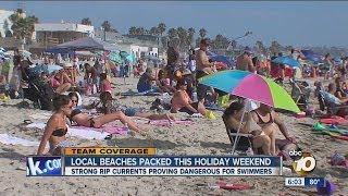 Crowds flock to local beaches for holiday weekend