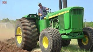 Big Tractors Plowing