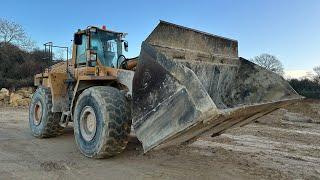 Pallet tine problems. Digging out for last of the concrete- bull fertility test.