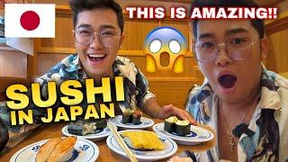 EATING SUSHI IN REVOLVING CONVEYOR BELT IN JAPAN 