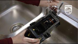 How to clean the brewing group of automatic coffee machines | Philips | HD8966