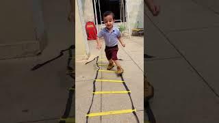 Cute baby trying to jump