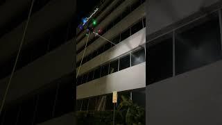 Expert drone window and building cleaning at night in Miami. FloridaDroneCleaning.com 408 444-5000