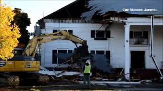 Excavation Company Sitetech Inc., of #Grafton, #Ohio, demolishes the former entrance to the historic