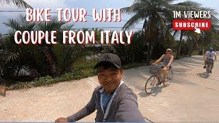 Bike tour around countryside Hoi An with couple from Italy| Lucky Tour Guide