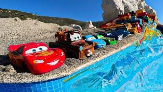 Disney Pixar Cars falling into deep pool, Lightning McQueen, Tow Mater, Mack, Sally, Francesco