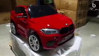 Unboxing and assembly of new BMW X6 M electric car for kids