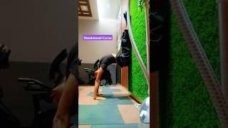 Handstand holding with curve. #yoga #backflexibility #handstandworkout #influencer #youtubeshorts