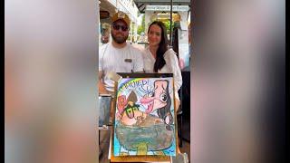 She was shocked at how funny her Maui Honeymoon caricature came out!