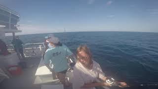 Mom's first catch on Captain Anderson deep sea fishing trip