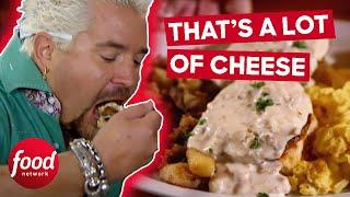 Guy Fieri Digs EXTREME Double Sausage Biscuits And Gravy | Diners, Drive-Ins & Dives