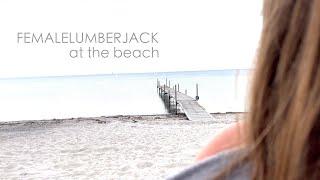 Femalelumberjack at the beach 4k HDR