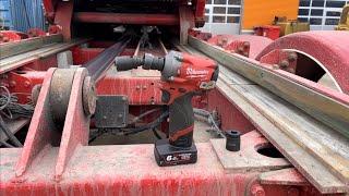 Milwaukee M12 FIWF12 1/2” drive impact wrench used to remove a broken air bellow on a heavy trailer.